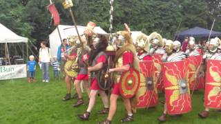 Roman Reenactment at the Amphitheatre in Caerleon Marching In [upl. by Ecinej756]